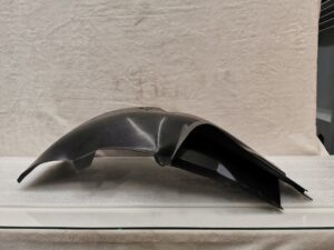 COQUILLE DE PASSAGE DE ROUE PORSCHE 964 / 96450412500 / N°6308